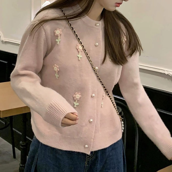 Knit jacket for women with elaborate floral appliqués and elegant pearl buttons Lune London