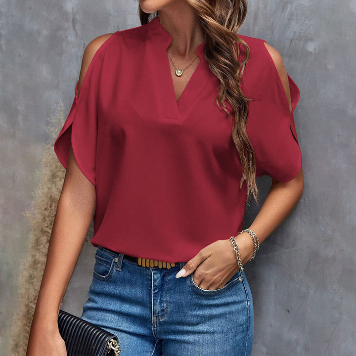 Chic & Stil Women's elegant blouse with cutout sleeve design and trendy high collar
