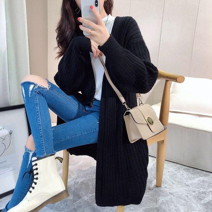Striped chunky knit cardigan for women with an open cut and long sleeves Lune London