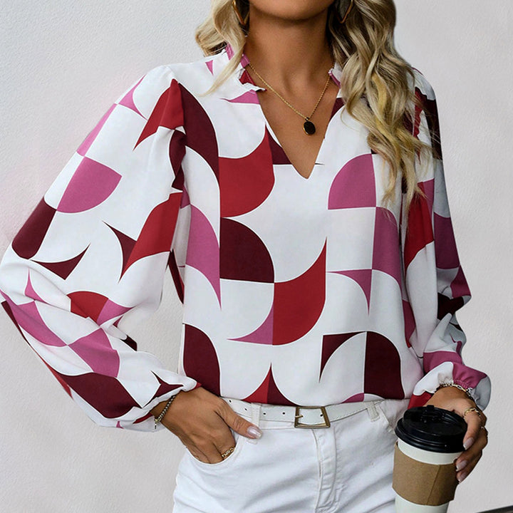 Trendy women's blouse with geometric print and voluminous sleeves Lune London
