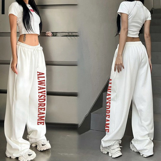 Women’s casual sweatpants with motivational lettering and elastic waistband Chic & Stil