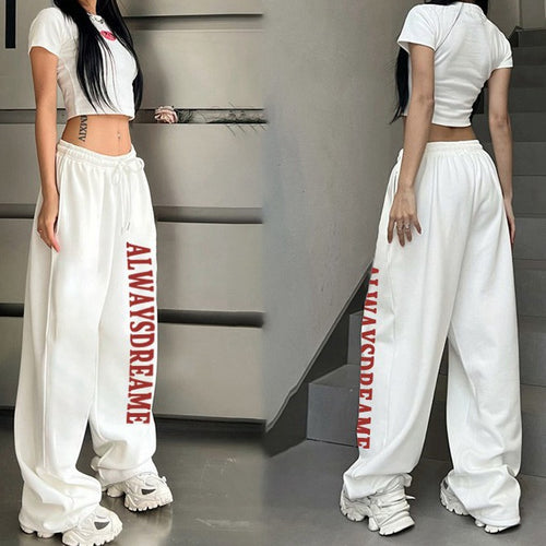 Women’s casual sweatpants with motivational lettering and elastic waistband Chic & Stil