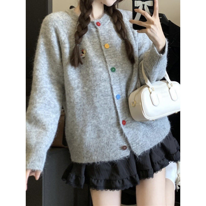 Knitted jacket for women with colored buttons and an embroidered pattern Lune London