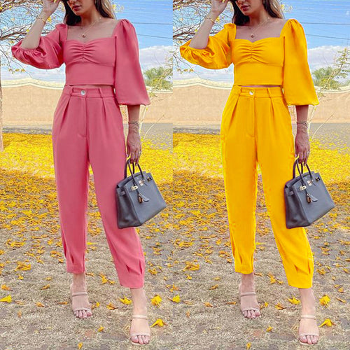 Two-piece outfit for women with puff sleeves and elegant high-waisted pants Lune London