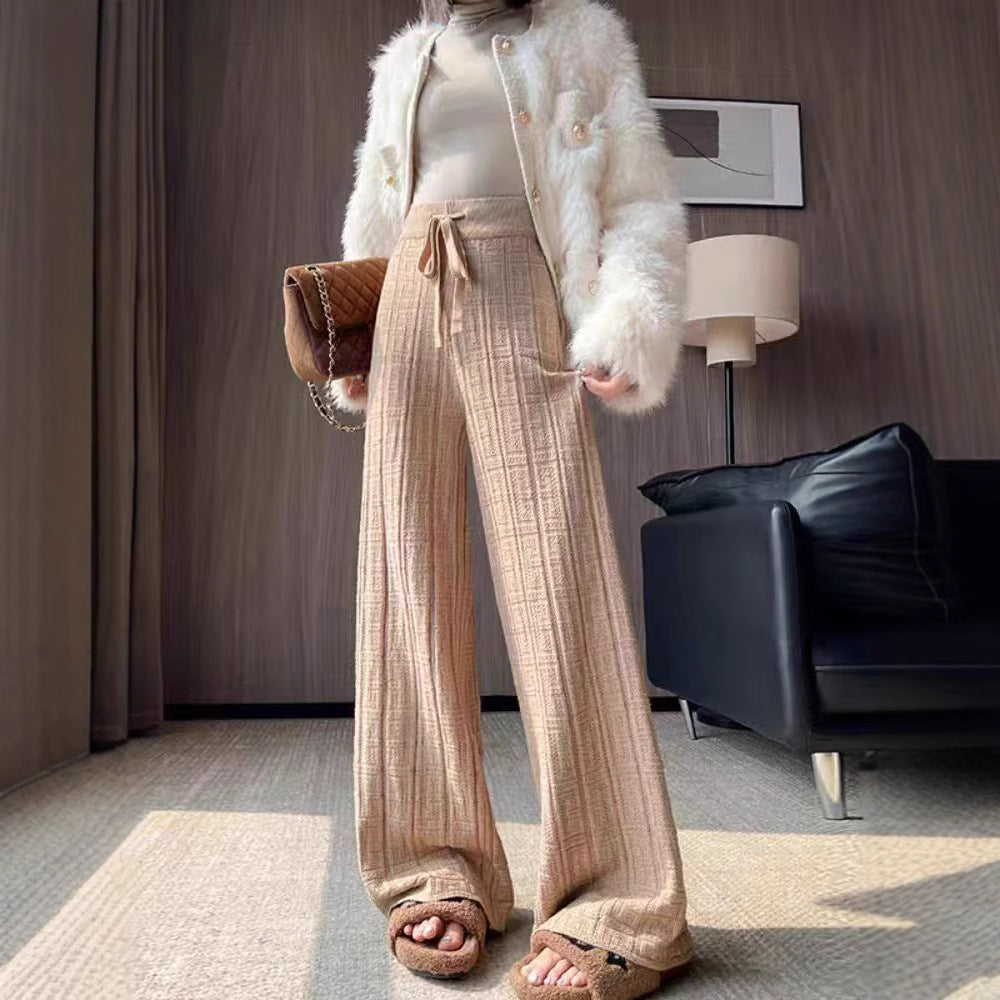 Loose linen pants for women with elastic waistband and striped design Lune London