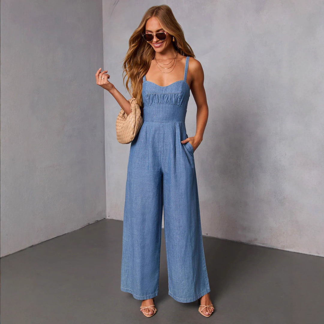 Chic & Stil Women's Denim Jumpsuit with Wide Legs and Elegant Straps
