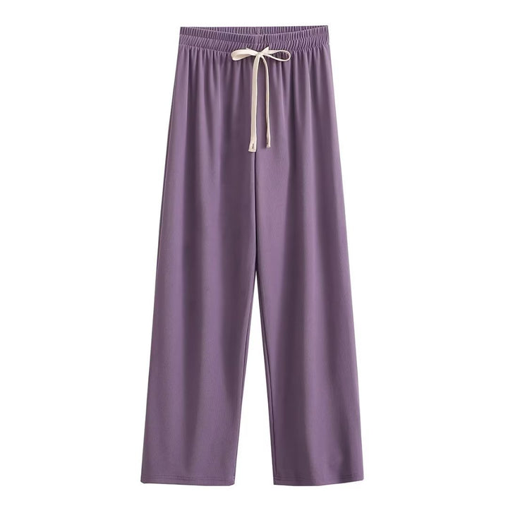 Wide palazzo pants for ladies with elastic waistband and decorative cord Lune London