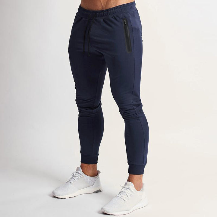 Fitted men's training pants with side zipper Lune London
