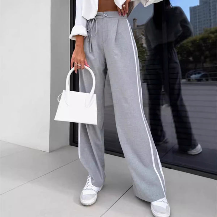 Pantalons larges de loisirs pour femmes avec des bandes latérales et ceinture à nouer Chic & Stil