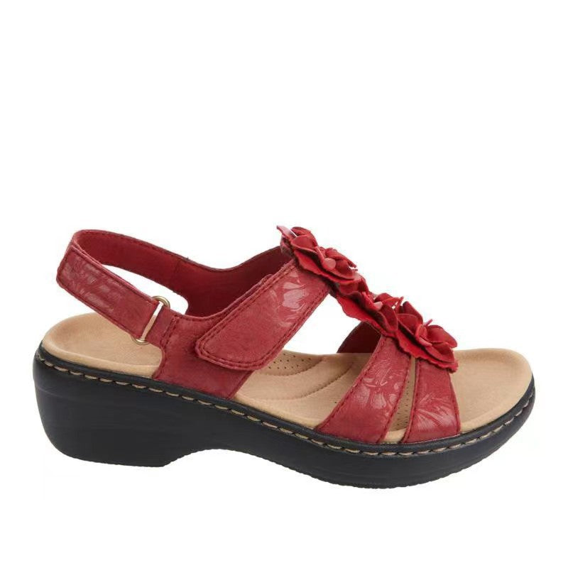 Comfortable wedge heeled sandals for ladies with delicate ruffle details Lune London