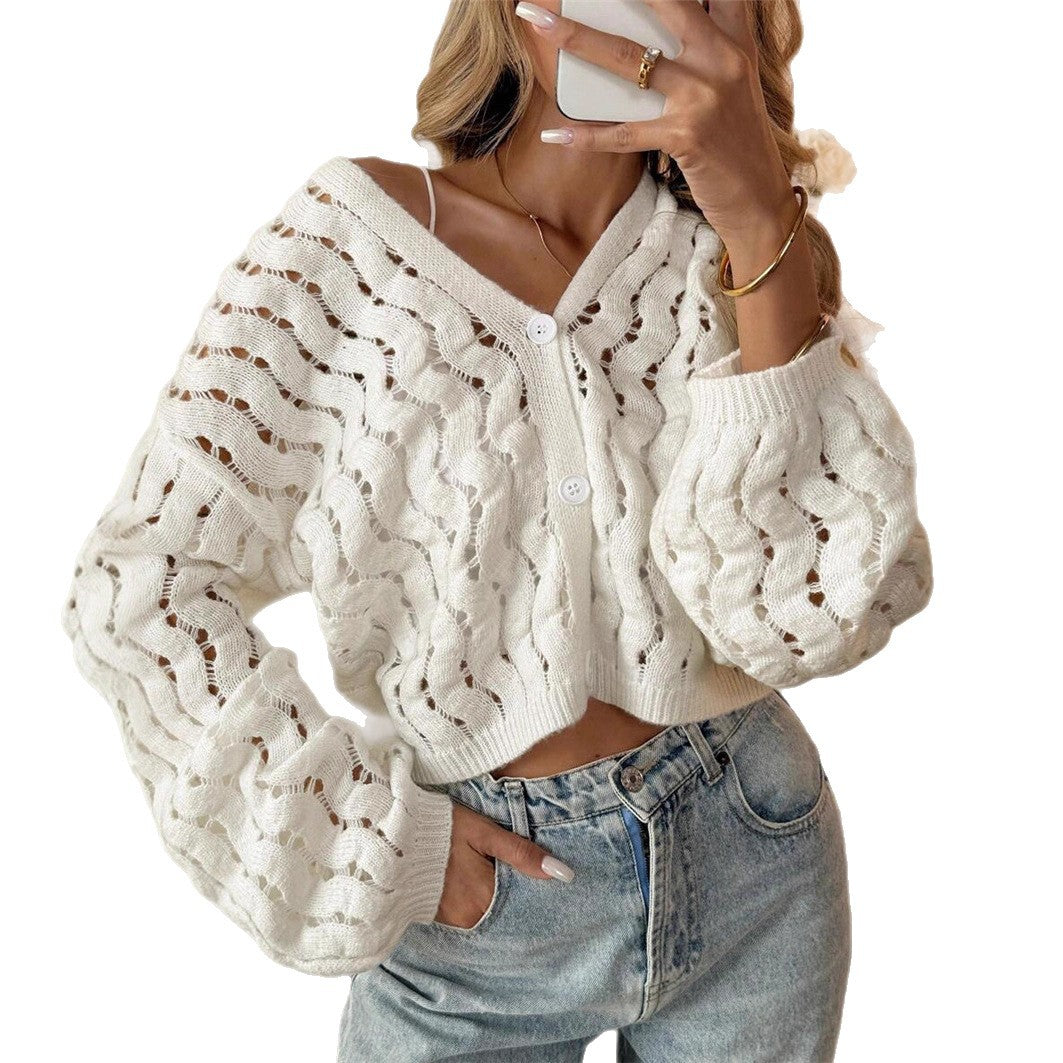 Women's knitted sweater with a unique hole pattern and a casual fit Lune London