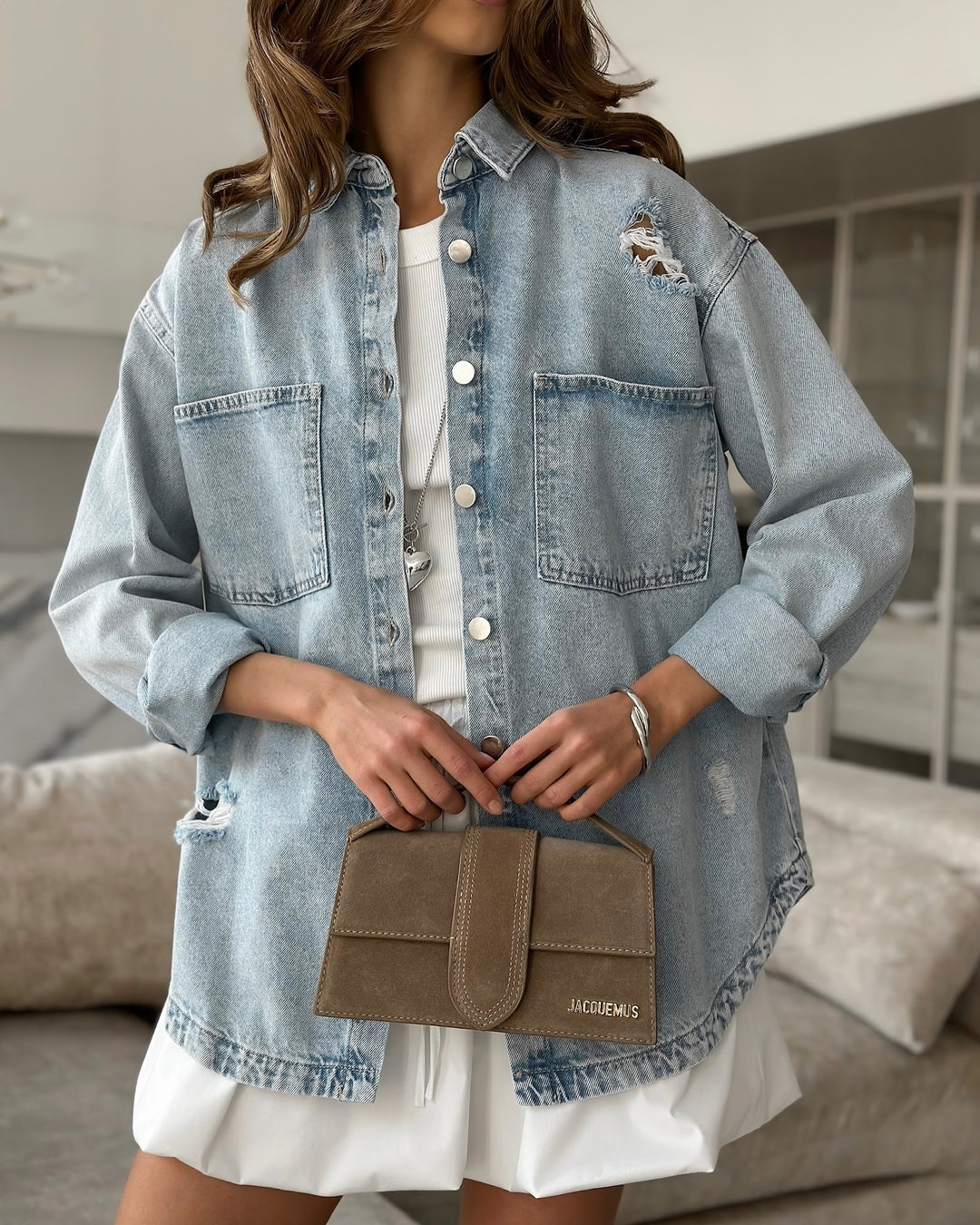 Women's denim jacket with a relaxed oversized fit and distressed details Lune London