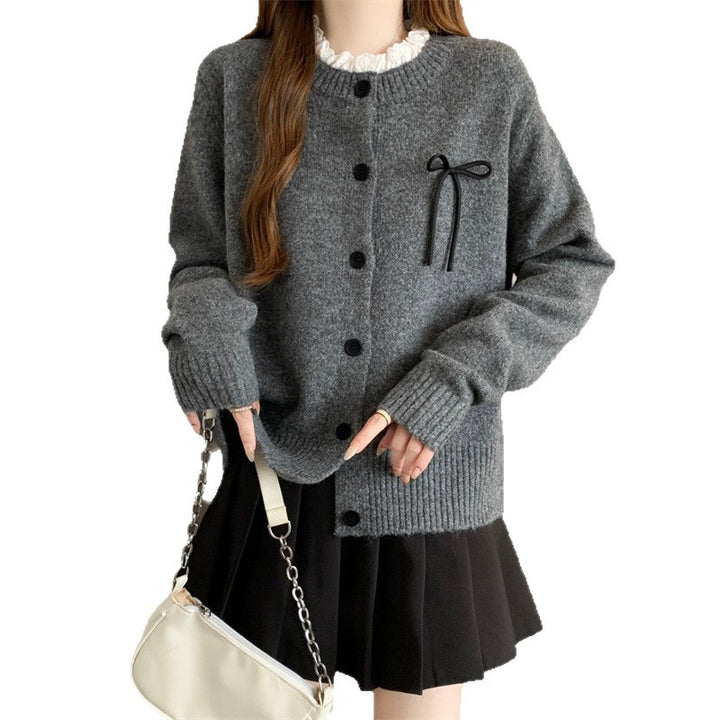 Knit cardigan for women with decorative buttons and a bow accent Lune London