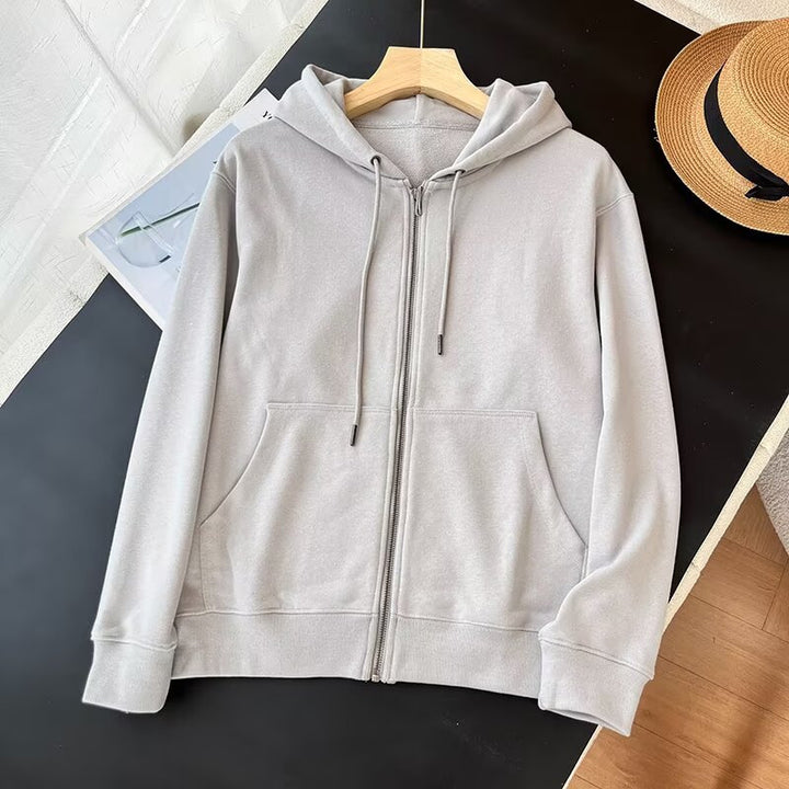 Veste à capuche zippée sportive pour femme avec poches kangourou pratiques Chic & Stil