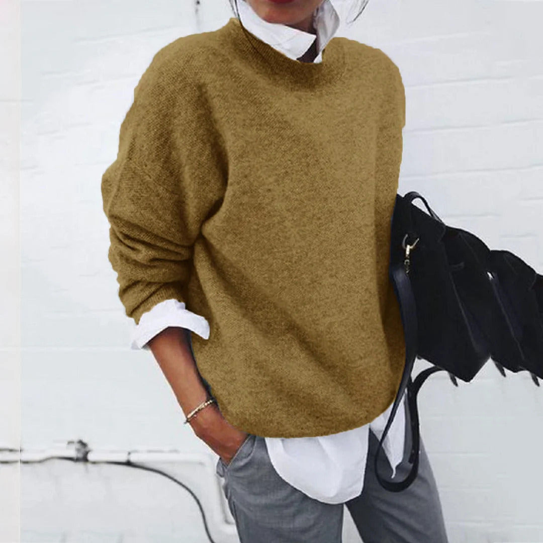 Pull féminin doux à col rond en mélange de tricots fins Chic & Stil