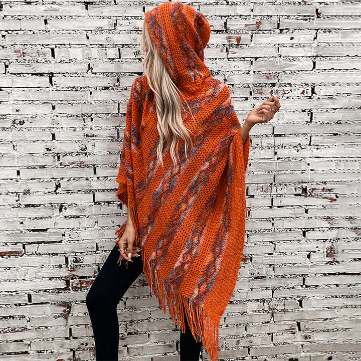 Ladies knitted poncho with hood and fringe design Lune London