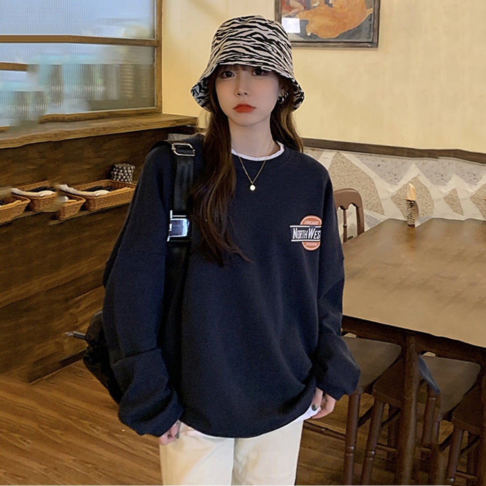 Women's casual oversized sweater with stylish logo and pleasantly soft interior lining Lune London
