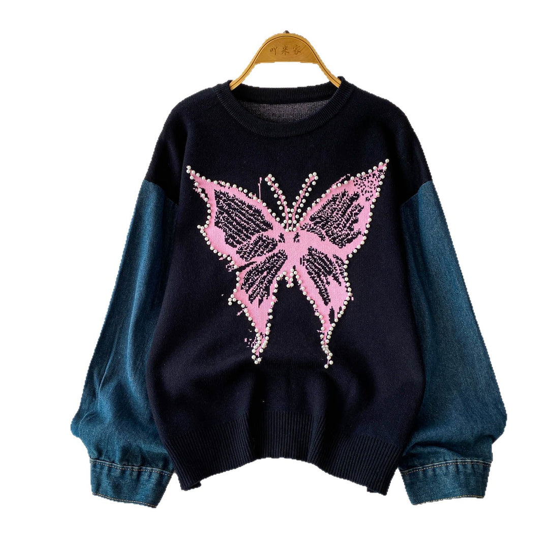 Pull élégant pour femmes avec motif de papillon et manches en denim Chic & Stil