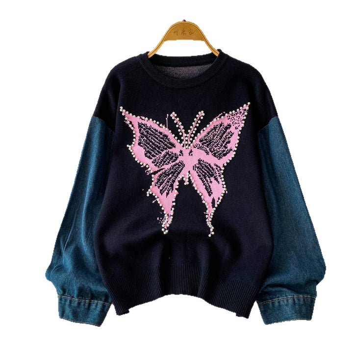 Pull élégant pour femmes avec motif de papillon et manches en denim Chic & Stil