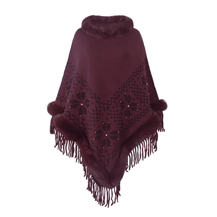 Elegant women's poncho with decorative fringe design and faux fur trim Lune London