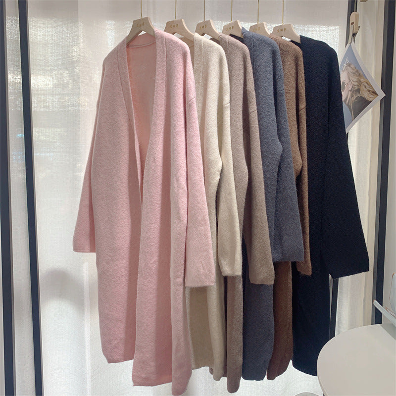 Manteau long en tricot pour femmes avec une coupe surdimensionnée et une doublure en polaire douce