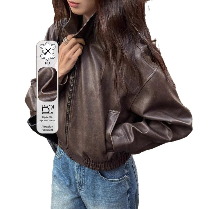 Trendy short coat for women in soft faux leather with elastic straps Lune London