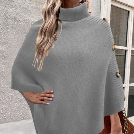 Ladies knitted poncho with high collar and button details Lune London