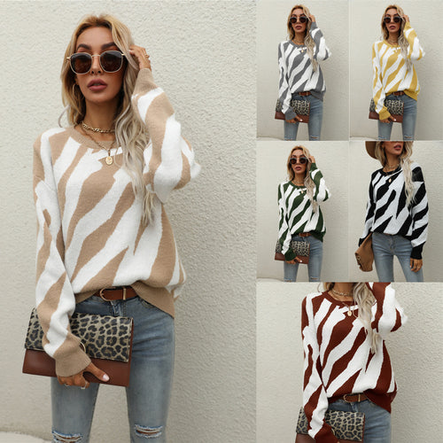 Pull tricoté élégant pour femmes avec un motif animal frappant et une coupe innovante Chic & Stil