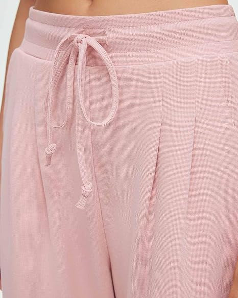 Pantalons décontractés amples pour femmes avec détails en bouton Chic & Stil
