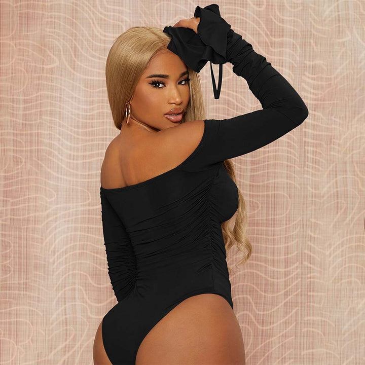 Elegant bodysuit for women with off-the-shoulder design featuring ruffle details and long sleeves Chic & Stil