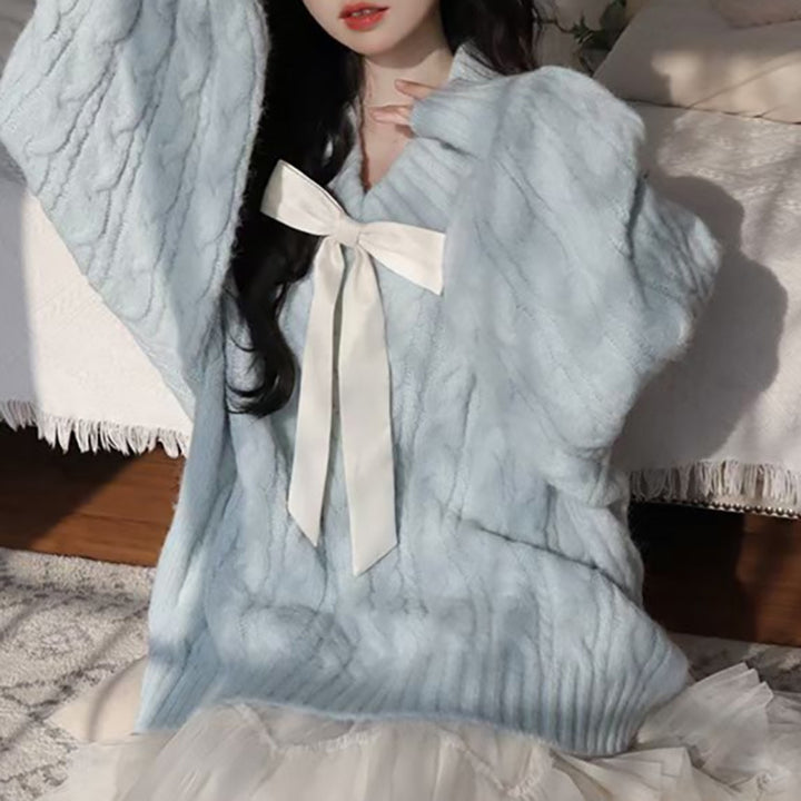 Ladies Large knitted sweater with bow detail and cable knit pattern Lune London