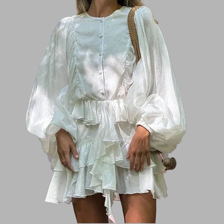 Playful ruffled summer dress for women with balloon-shaped sleeves and button detail Lune London