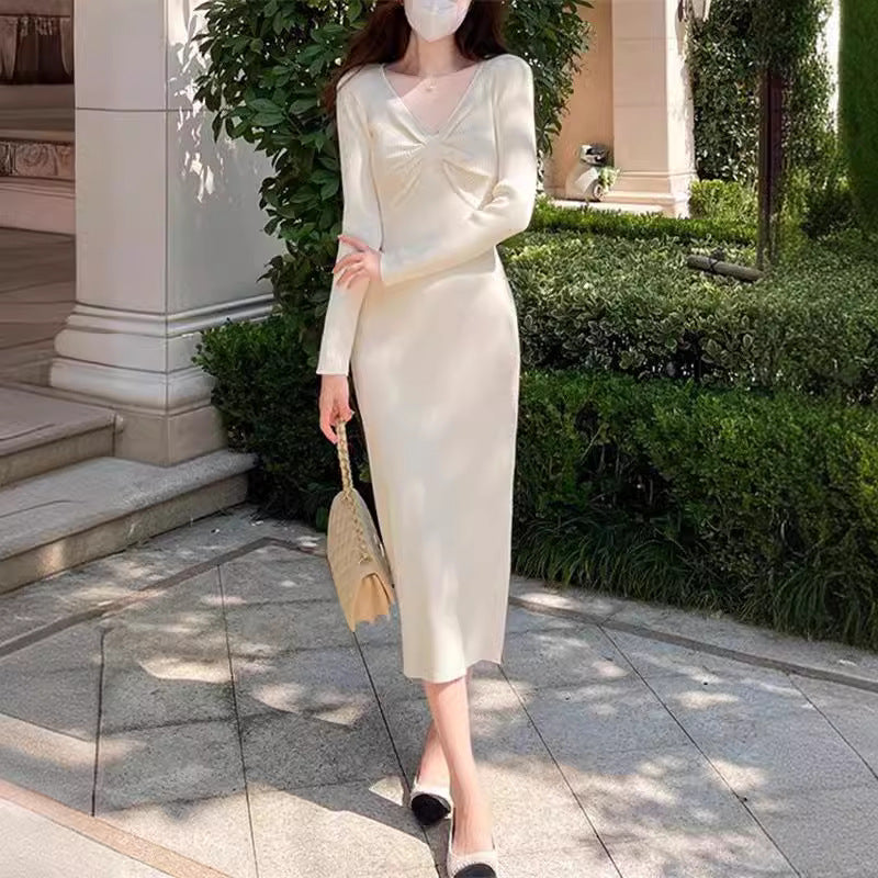 Knit dress for women with plunging V-neck and elegant ribbed structure Lune London