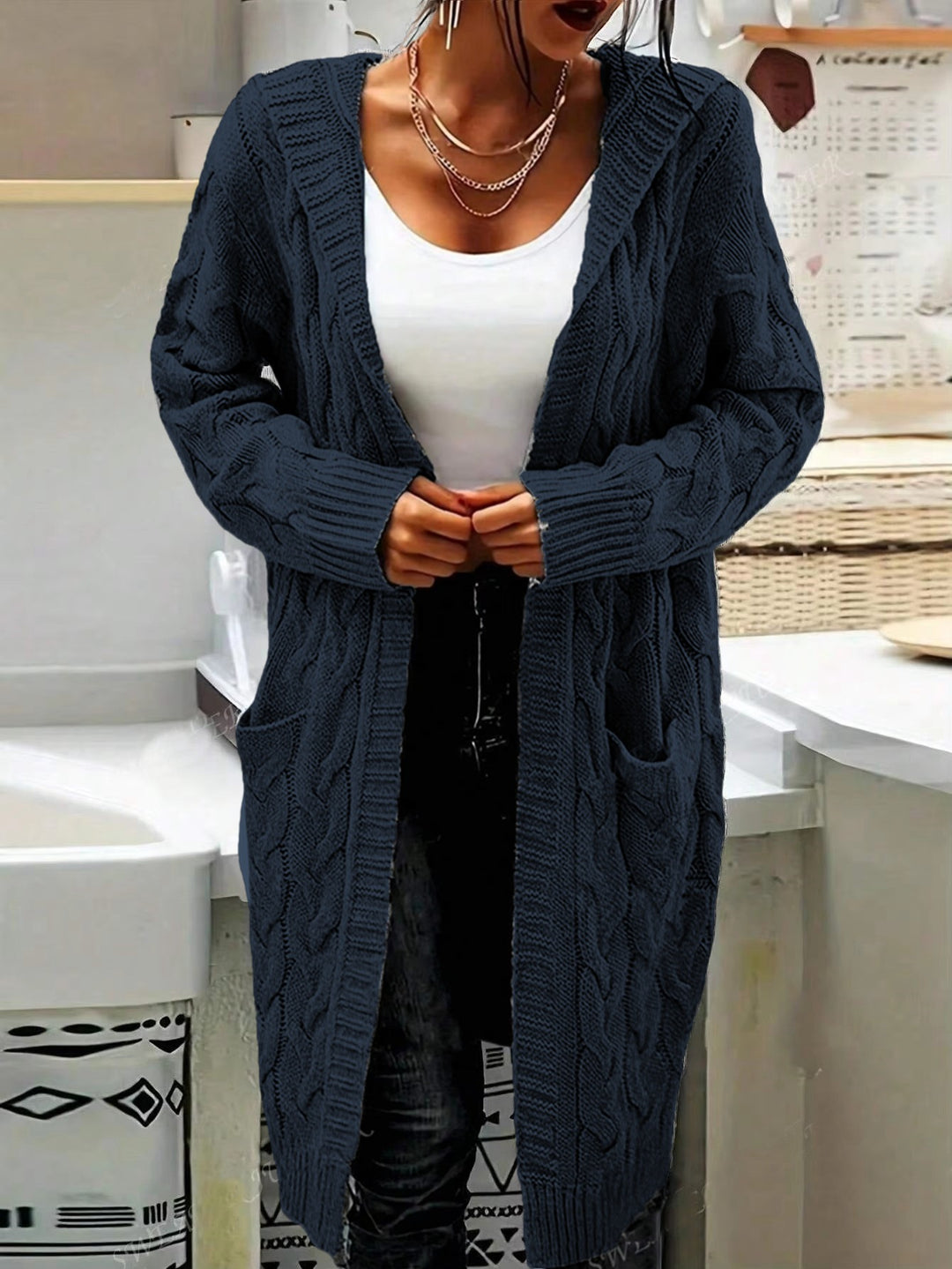 Chunky knit cardigan for women with practical pockets and elegant twisted details Lune London