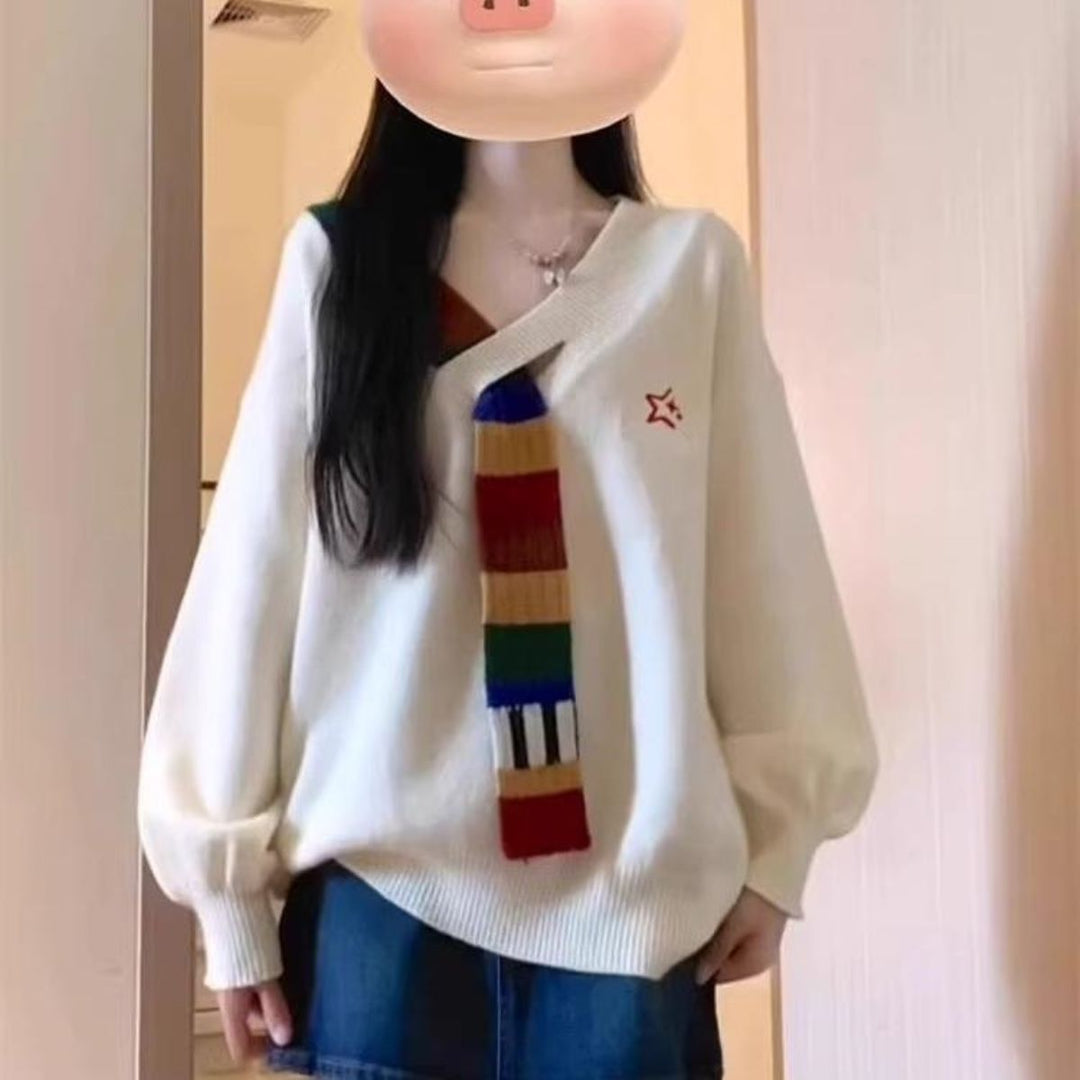 Pull élégant pour femme avec col en V et rayures colorées Chic & Stil