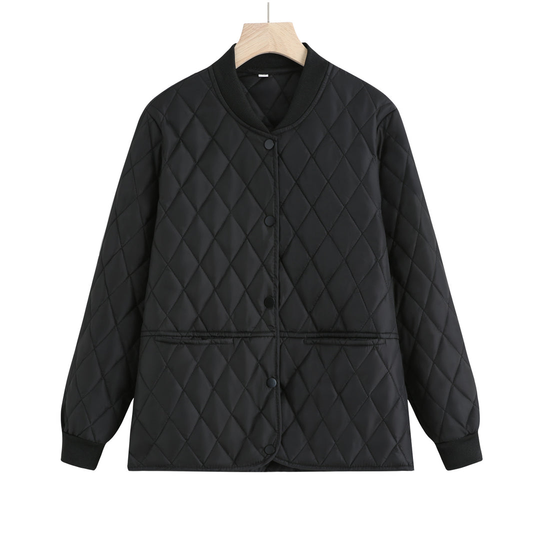 Women's quilted transition jacket with practical pockets and elastic cuffs Lune London
