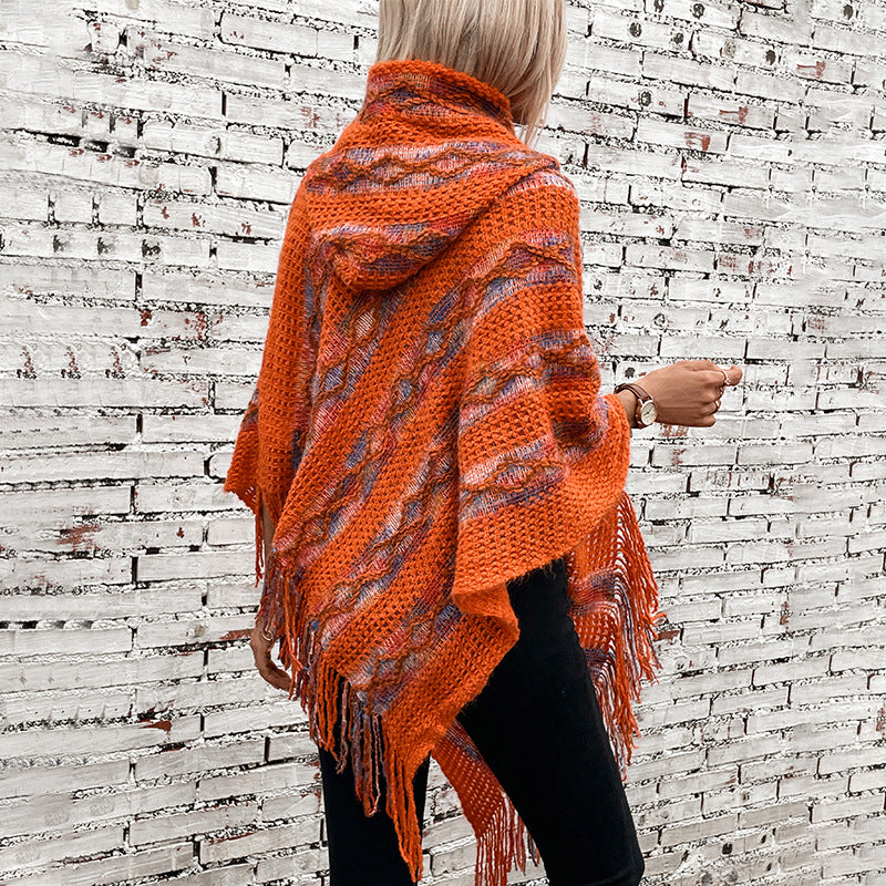 Ladies knitted poncho with hood and fringe design Lune London