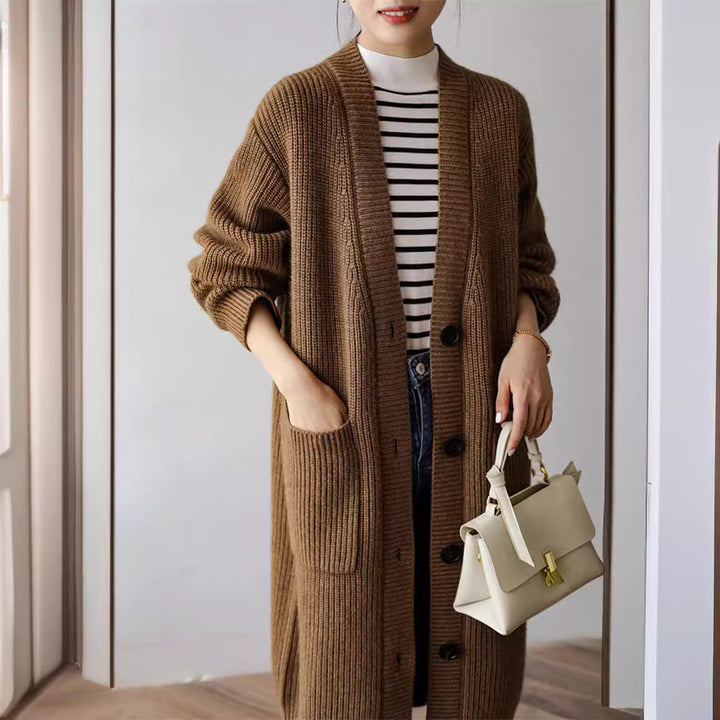 Knit coat for women with practical side pockets and elegant button details Lune London