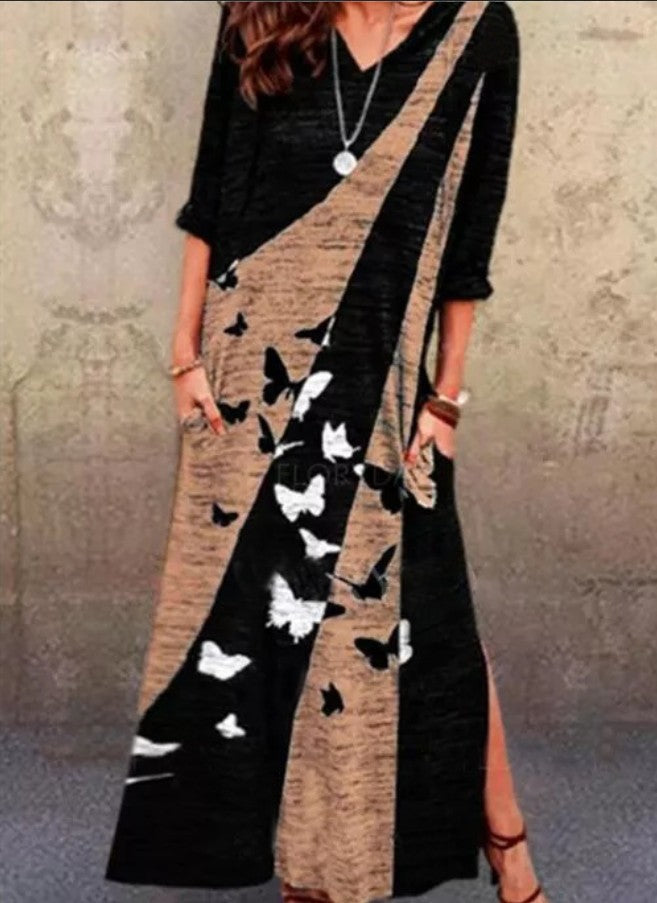 Maxi dress for women with an artistic butterfly design and practical pockets Lune London