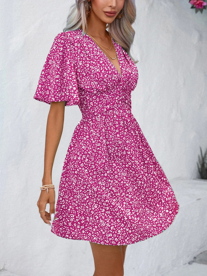 V-neck dress with snowflake pattern for women with puff sleeves and elastic belt Lune London