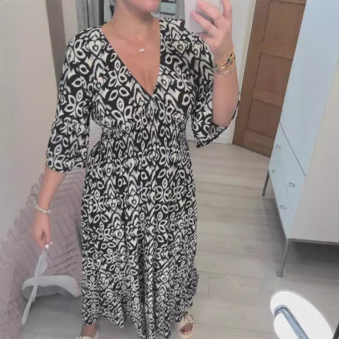 Maxi dress for women with V-neck and striking floral pattern Lune London