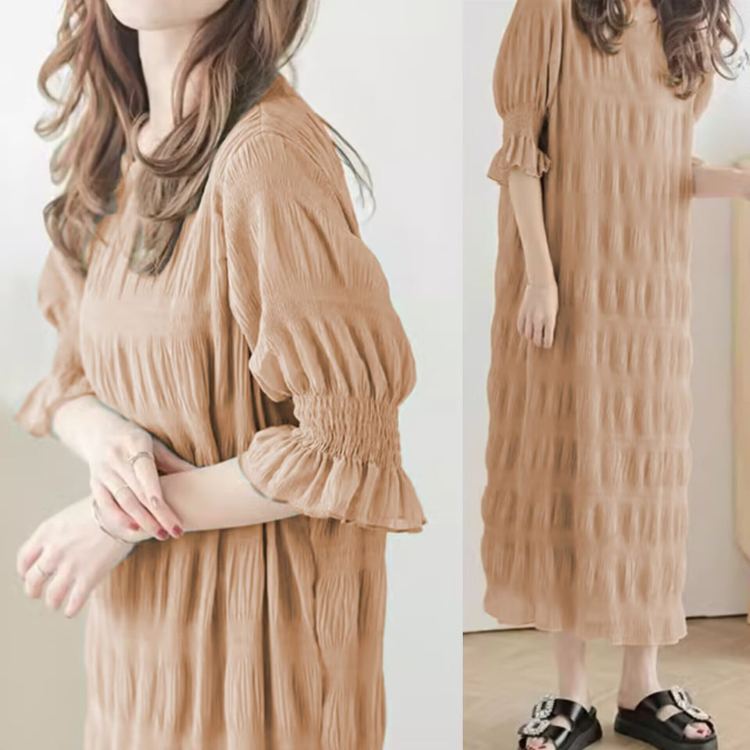 Casual maxi dress for women with elastic puff sleeves and a refined textured design Lune London