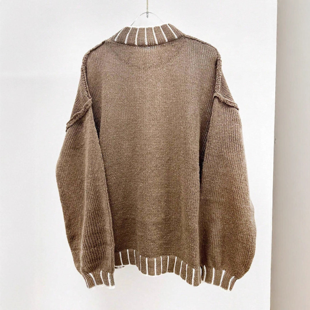 Pull en tricot décontracté pour femmes avec col montant et manches ajustables Chic & Stil