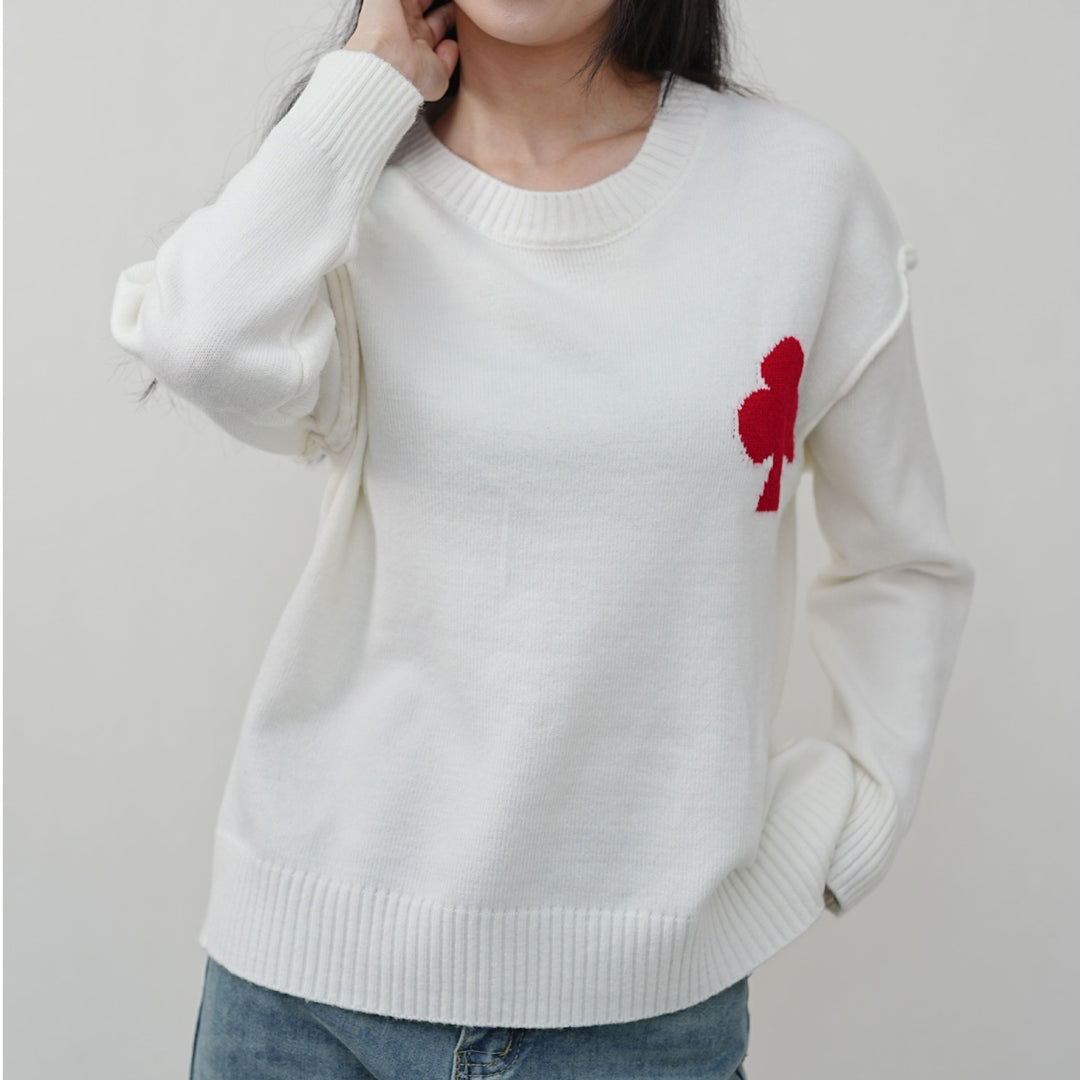 Pull court à motif pour femmes en matière tricot doux avec logo emblématique Chic & Stil