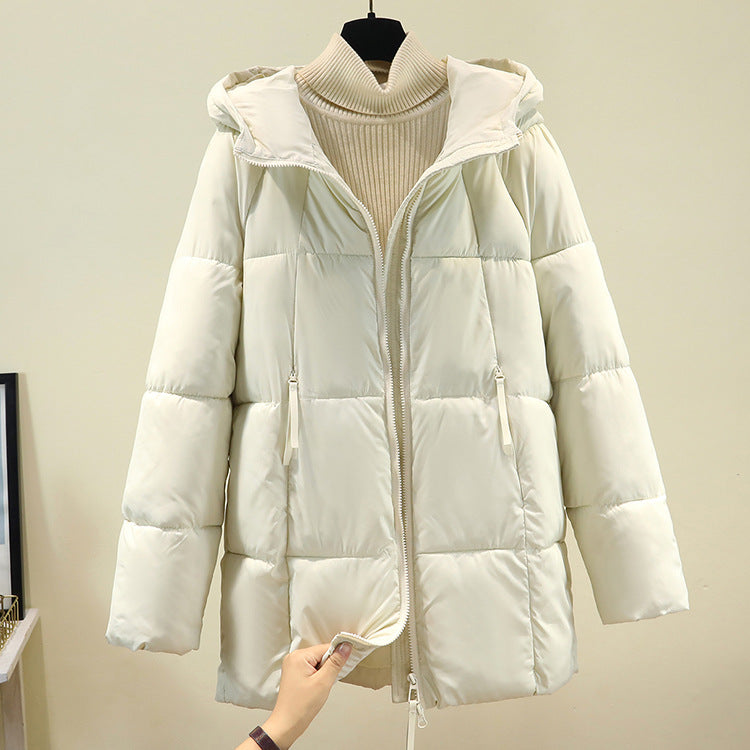 Ladies comfortable and stylish padded jacket with hood and practical zip pockets Lune London