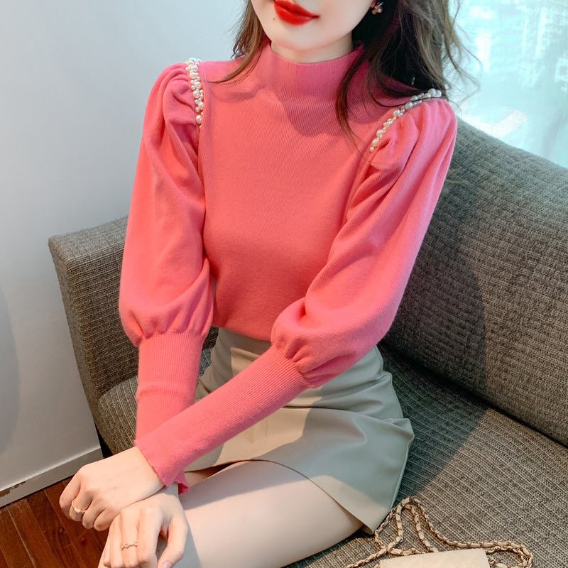 Elegant sweater for women with puff sleeves and pearl details Lune London