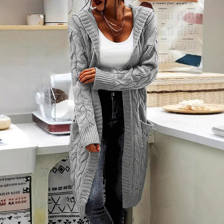 Ladies chunky knit cardigan with side pockets and structured cable design Lune London