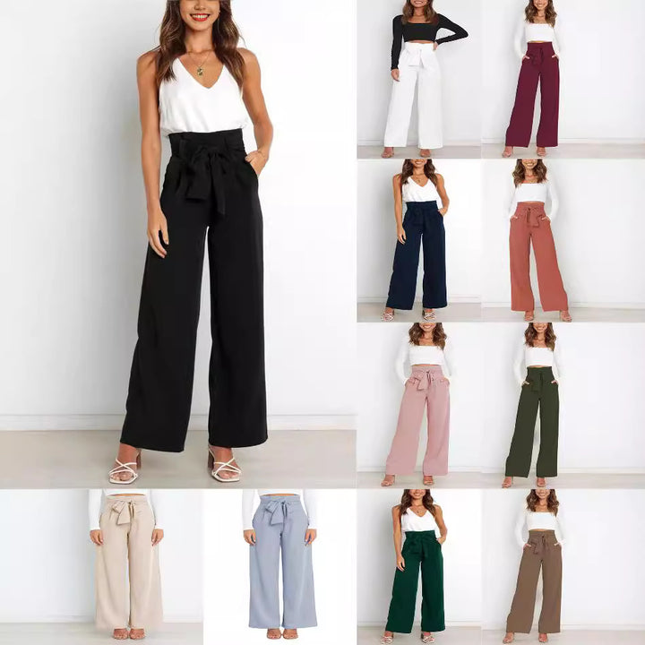 Wide fabric trousers for women with a tie belt and stylish pockets Lune London