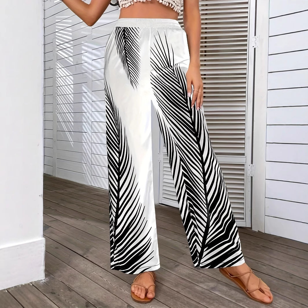 Elegant and lightweight palazzo pants for women with palm tree pattern Lune London