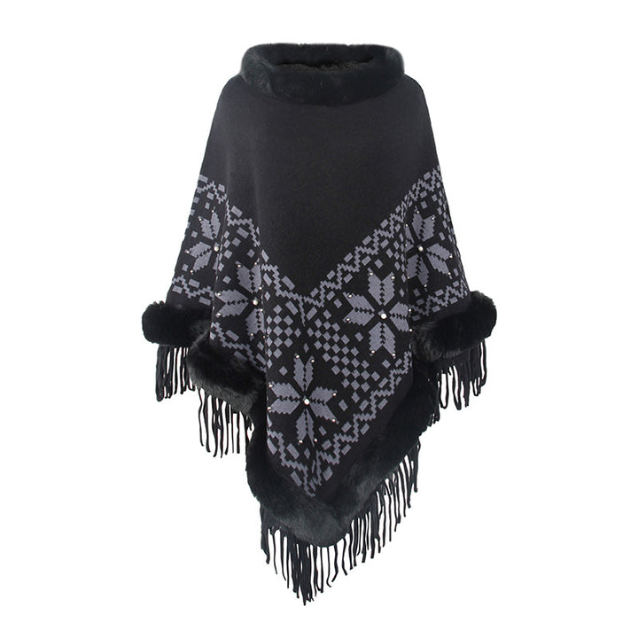 Elegant women's poncho with decorative fringe design and faux fur trim Lune London